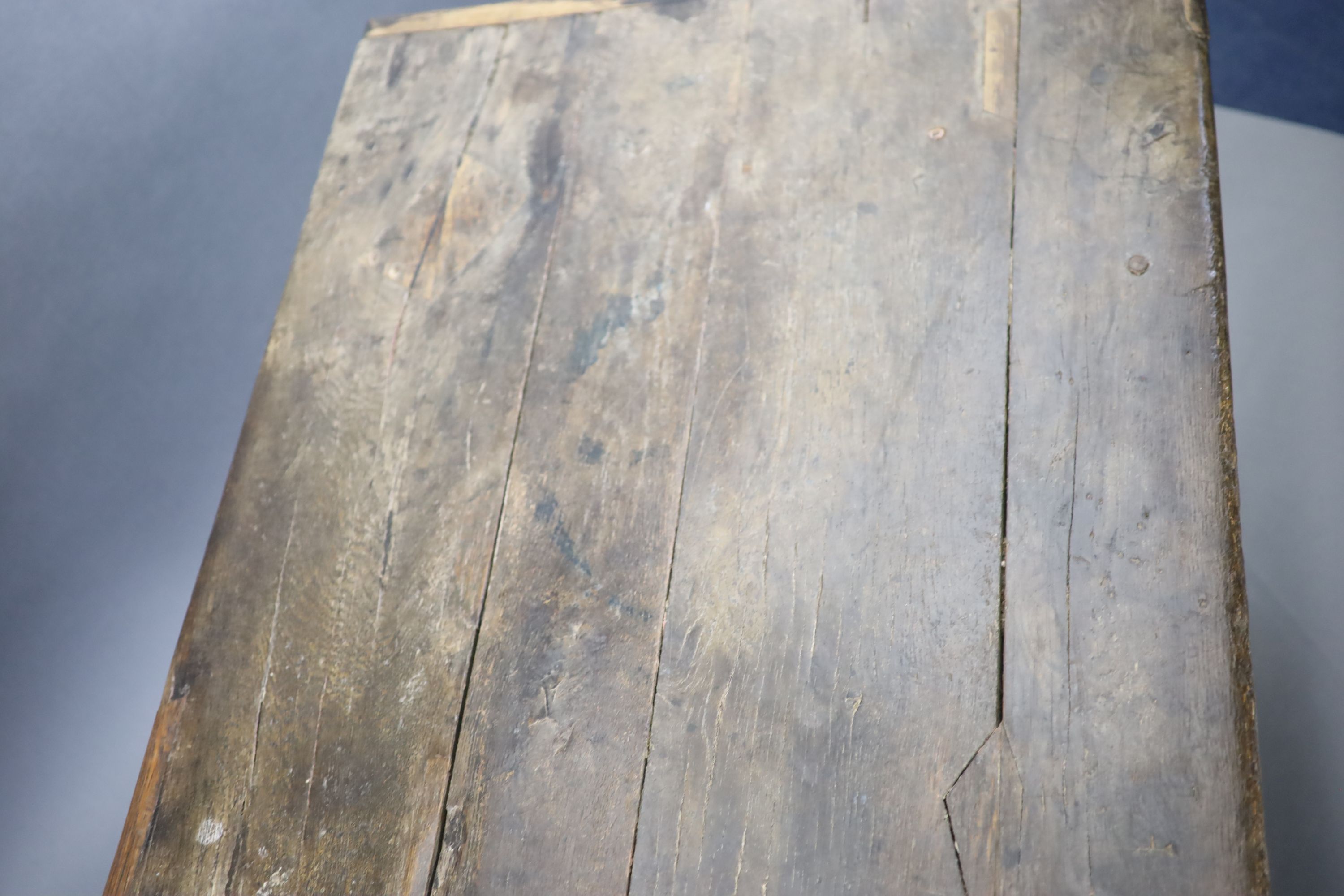 A 17th century oak and elm refectory table, L.255cm W.82cm H.78cm